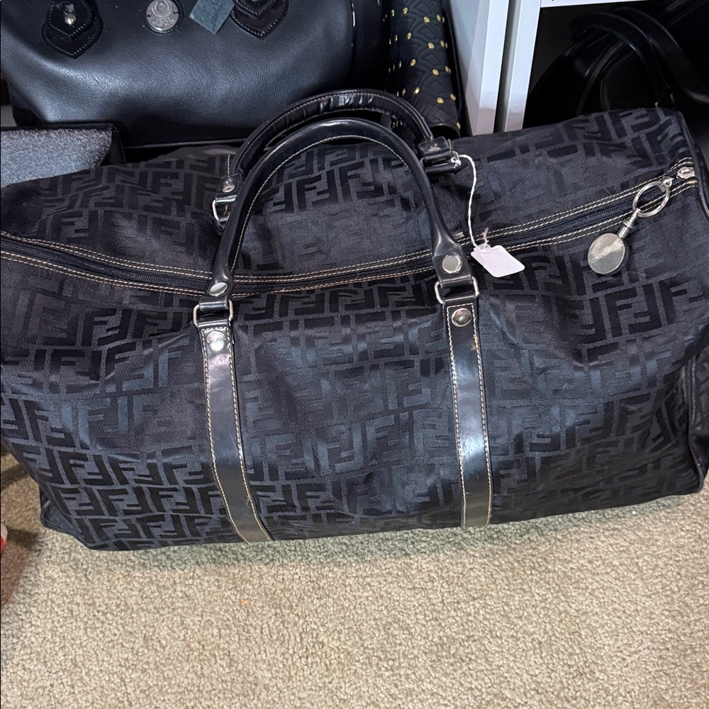 Black Travel Duffel Bag with Subtle Monogram Pattern